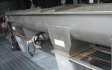 Water filtration sludge conveying and outloading