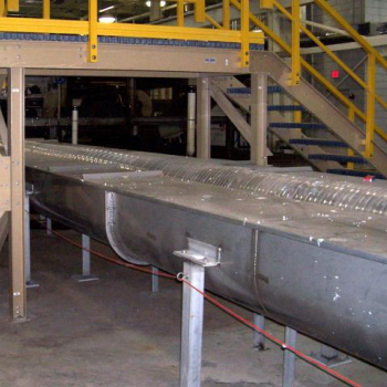 Extreme length sludge conveying